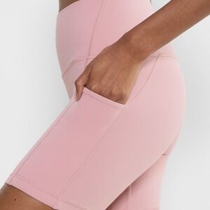 Aritzia tna Golden pink butter cheeky pocket hi-rise 7” biker shorts size 4